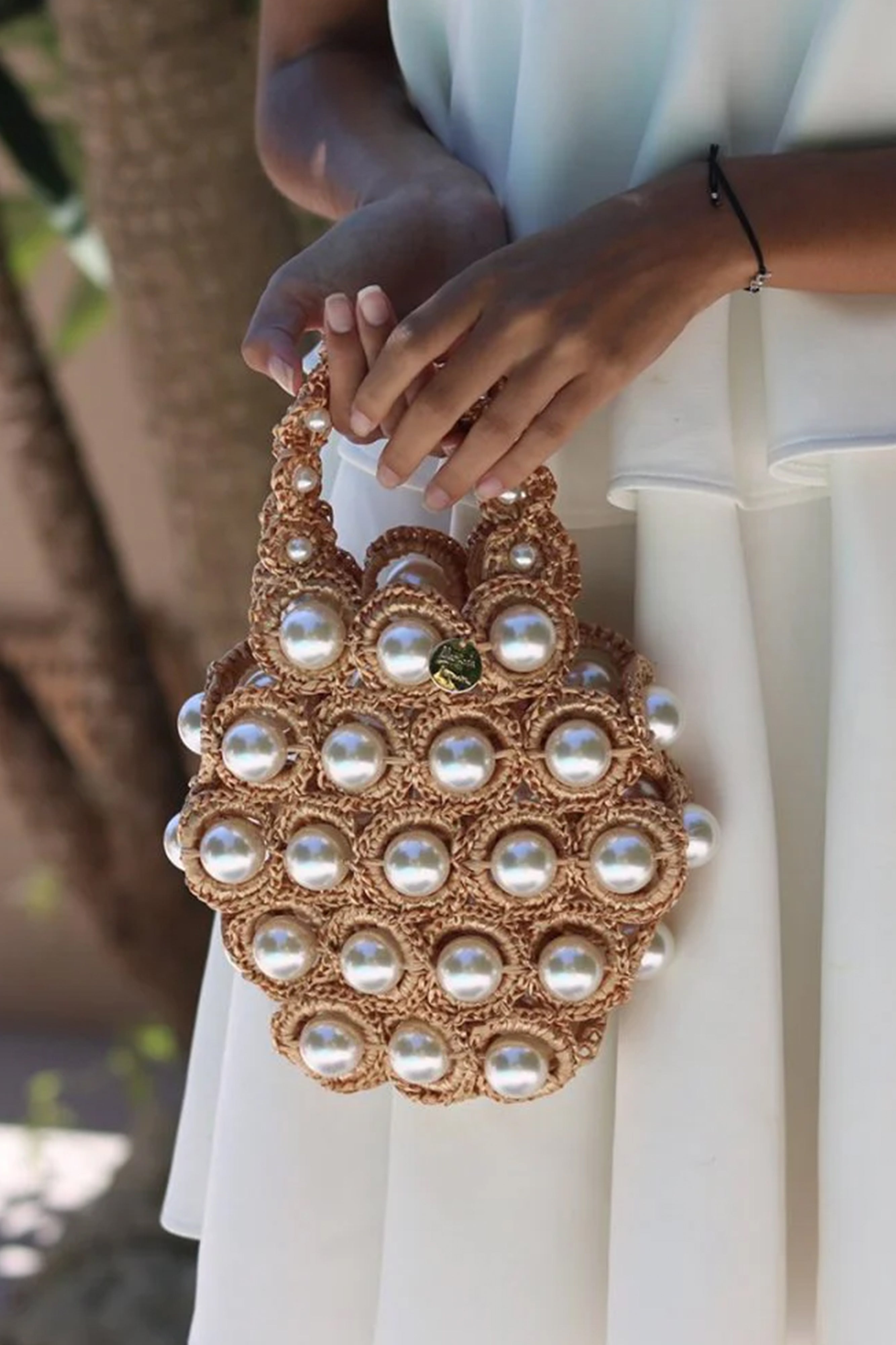 HANA, the gold bag