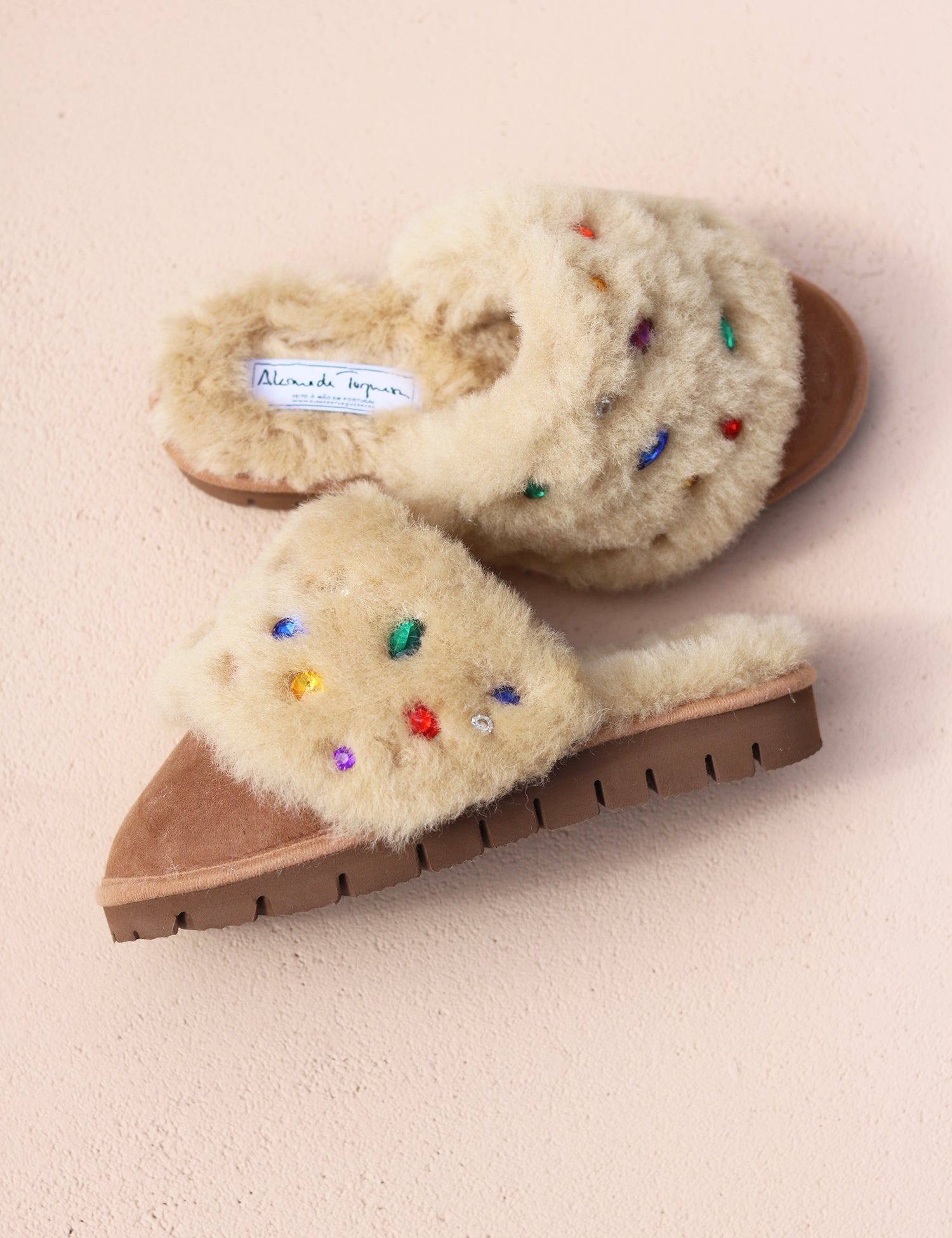 Jasmine flat shearling mule flat lay — cream shearling with multicoloured gemstone embellishments and Alameda Turquesa label, made in Portugal by Alameda Turquesa 