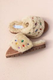 Jasmine flat shearling mule flat lay — cream shearling with multicoloured gemstone embellishments and Alameda Turquesa label, made in Portugal by Alameda Turquesa 