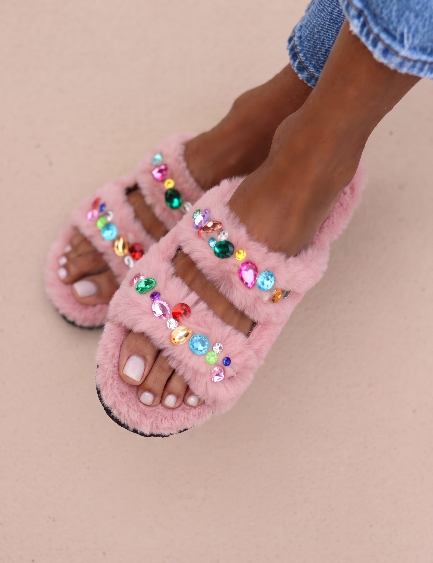 Pink shearling gem sandals, with gems and crystals, worn with denim by Alameda Turquesa
