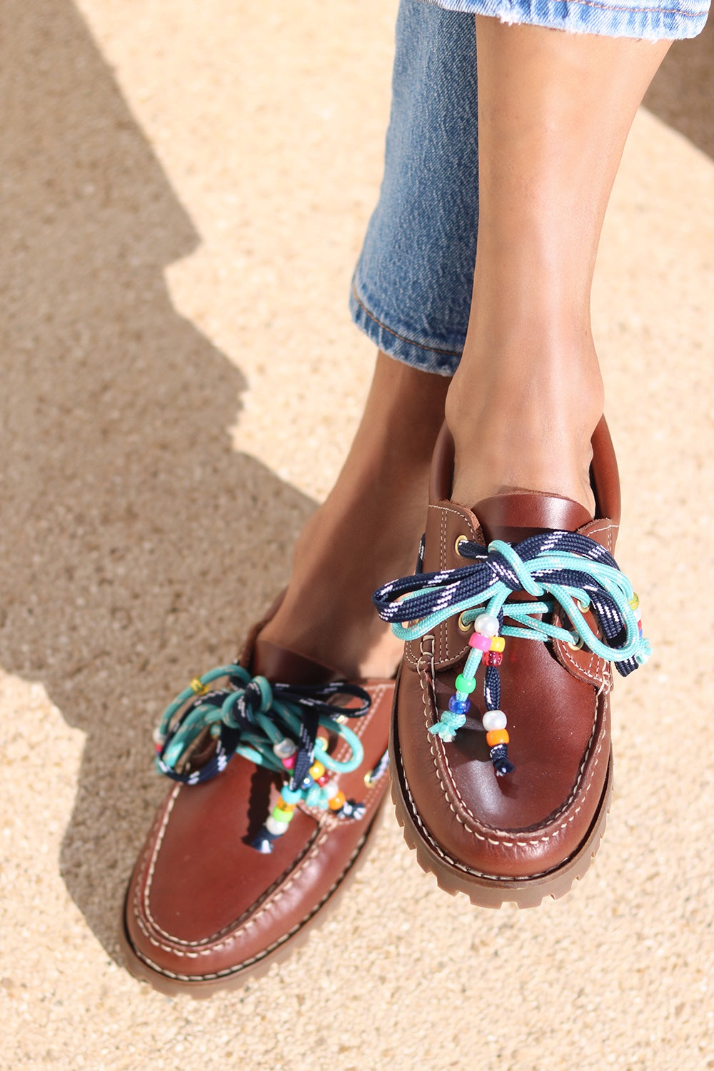 Ben chunky leather boat shoes close up — handcrafted turquoise and multicolor beaded laces detail on tan leather boat shoe, hand-stitched construction by Alameda Turquesa Portugal