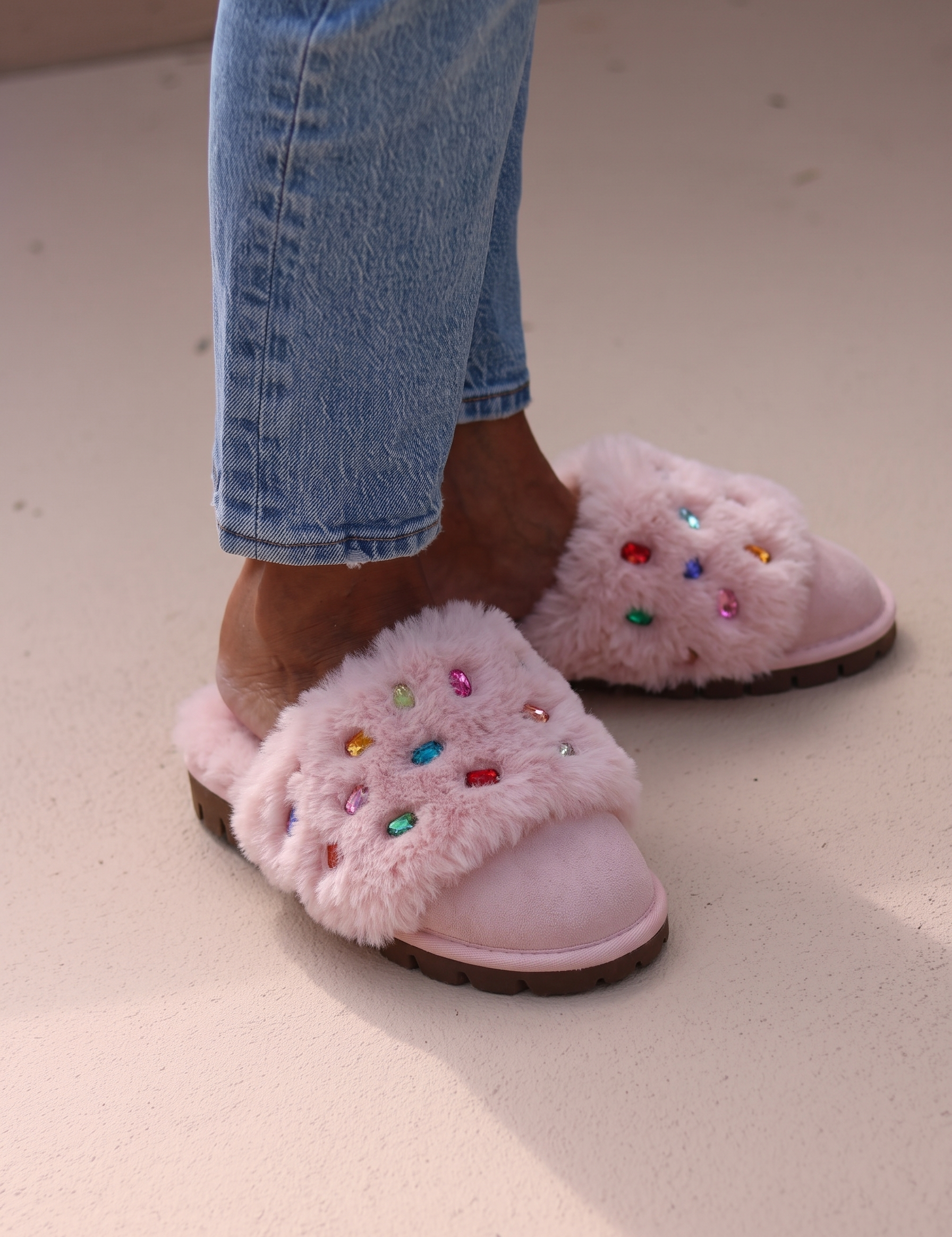 Jasmin Pink gem shearling slippers worn with denim by Alameda Turquesa