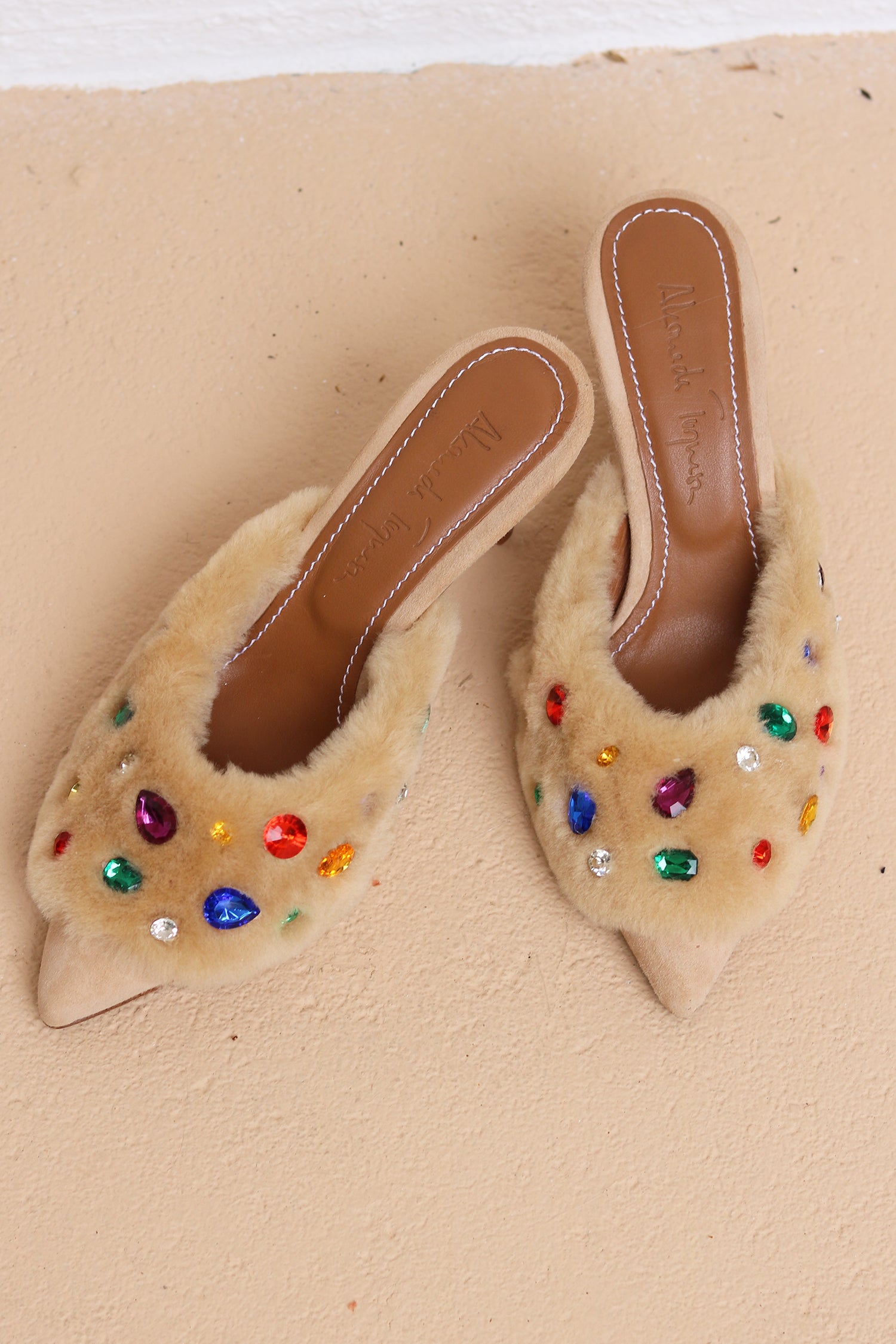 Colourful gem embellishments on Jasmine Cream shearling mules