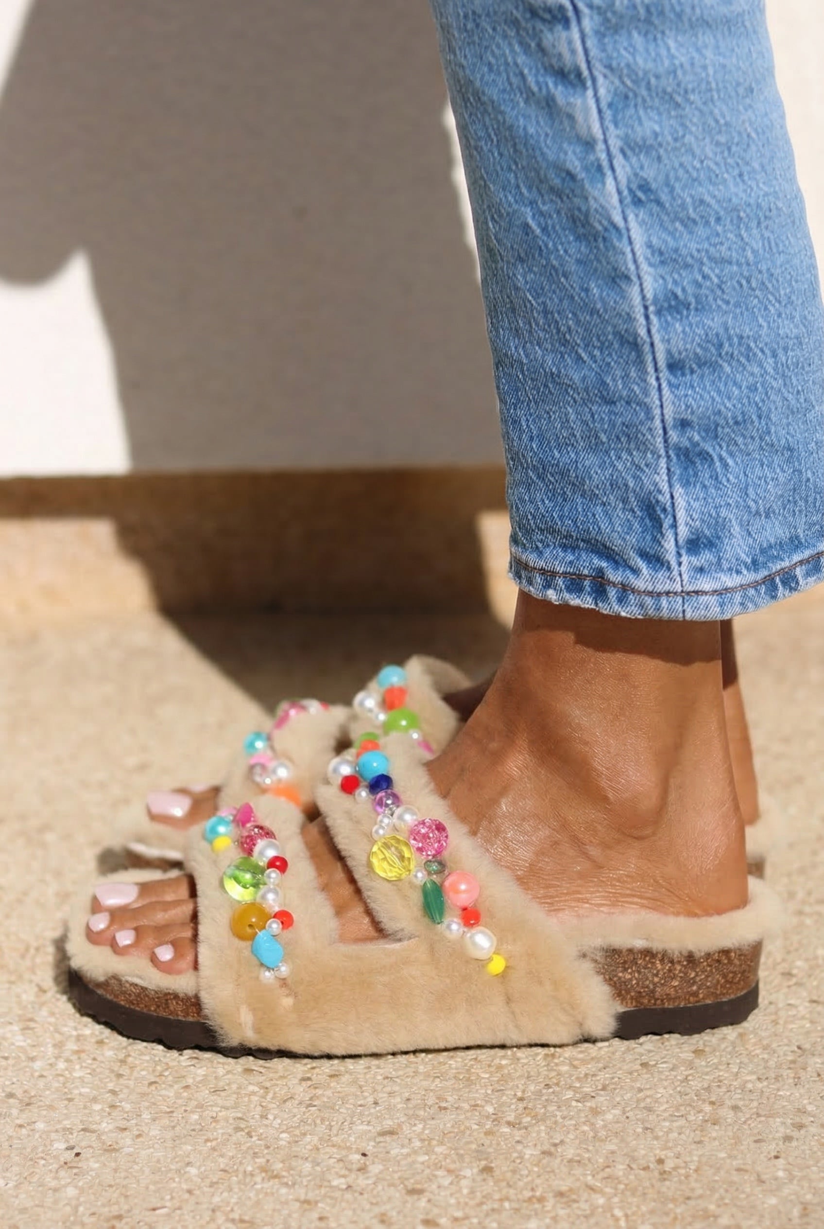 Mimi Candy shearling sandals close up — hand-applied multicolour bead and pearl detail on double shearling straps, handcrafted in Portugal by Alameda Turquesa