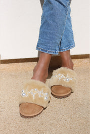 Pinctada Classic Pearls shearling mules worn pair — caramel shearling slides with hand-applied pearl cluster embellishment, luxury slippers by Alameda Turquesa Portugal