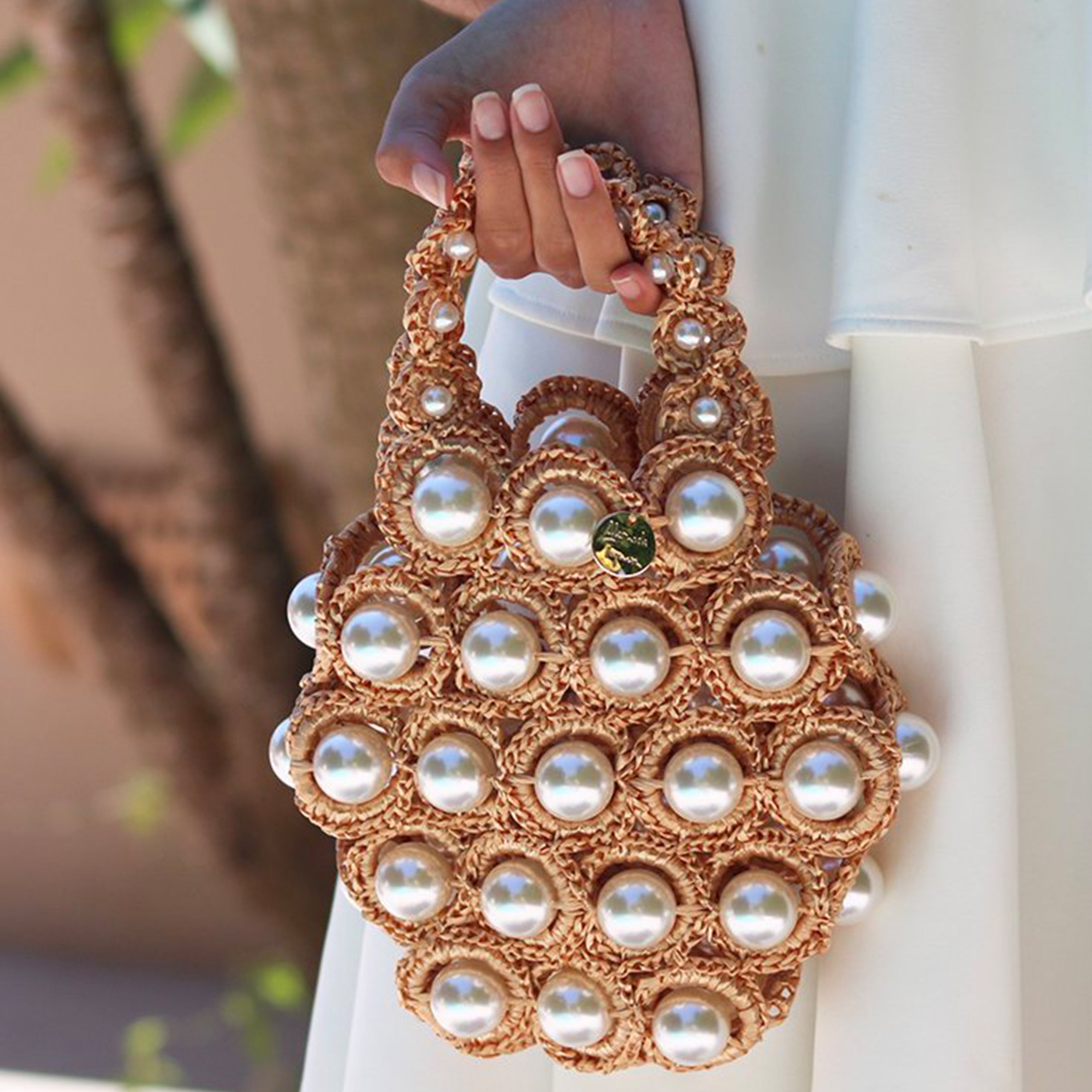 HANA-BAG-ALAMEDA-TURQUESA-CROCHET-PEARLS-EMILY-IN-PARIS-LILY-COLLINS.jpg