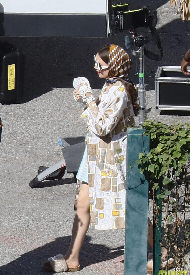 alameda-turquesa-pinctada-shearling-slippers-pearls-shoes-portuguese-brand-lily-collins-shooting-emily-in-paris-season-two-13.jpg